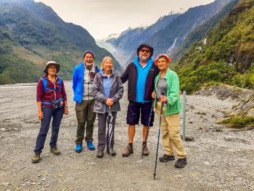 MoaTrek guests and Kiwi guide Tim walking at Franz Josef Glacierf