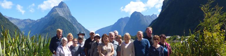 Group photo at Milford Sound - New Zealand Small Group Tours with MoaTrek
