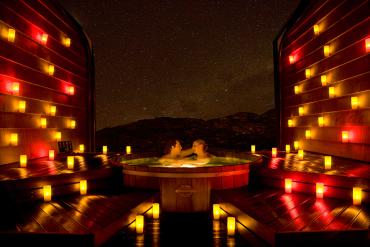Private hot pool by candlelight - Relaxing Tours NZ
