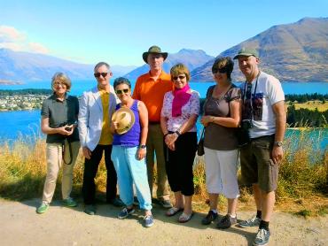 Photo with friends in Queenstown, lake and mountain scenery - NZ South Island Itinerary
