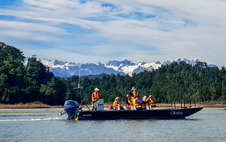 Nature Cruise on Okarito Lagoon, Southern Alps in background