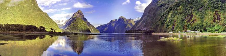 Milford Sound mountains and reflection - Where we visit on tour